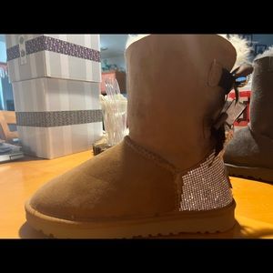 Womens size 7 uggs with rhinestones.